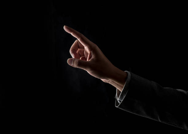 istock Raise your finger on a black background 1147313147