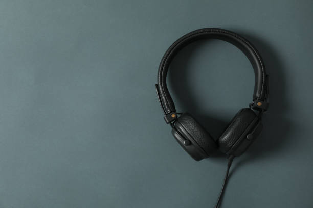 istock Headphones on dark background, space for text 1147314720