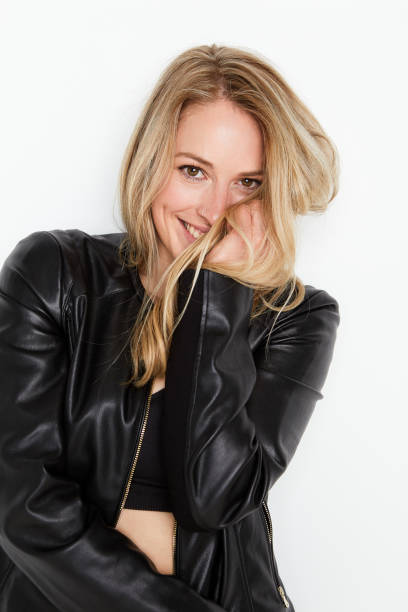 istock Attractive young woman smiling and having fun 1147315601