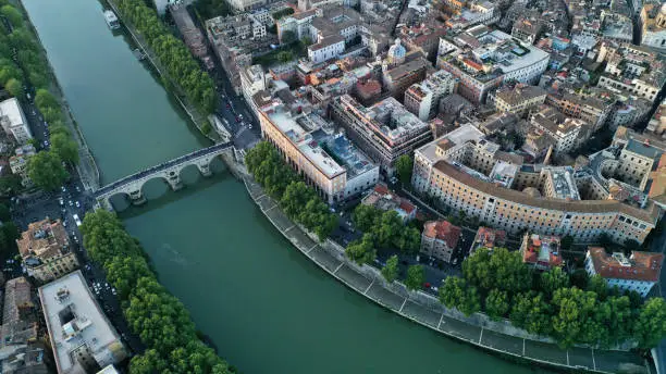 Photo of Aerial view of the Tiber River and center of Rome, Italy. Coliseum. Ancient capital. From drone.