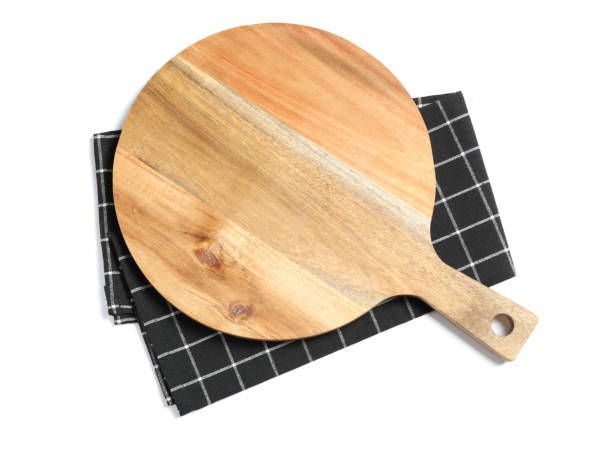 istock Cutting board with kitchen towel isolated on white background, top view 1147321178