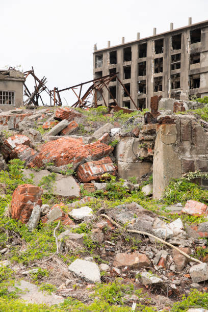 Hashima Island, Japan - 11 April 2019: Hashima Island-Gunkanjima meaning Battleship Island, is an abandoned island lying about 15 kilometers (9 miles) from the city of Nagasaki, in southern Japan. This is former coal mining island. It is old coal mine in Japan closed at 1974 due to the closure of coal mine.