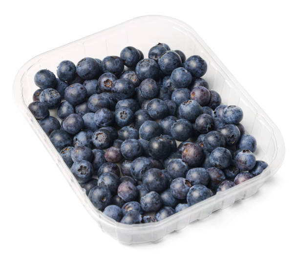 istock Plastic packaging of fresh juicy blueberries. White isolated background. Top side view. 1147324514