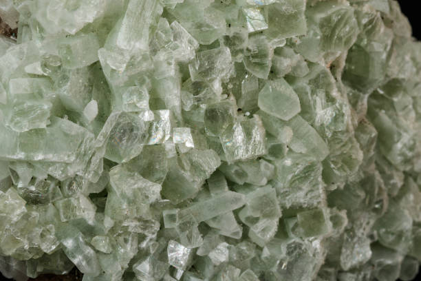 istock Macro stone Apophyllite mineral on black background 1147326060