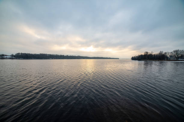 istock almost frozen river in winter 1147326081