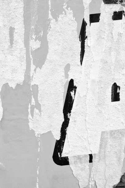 istock Blank white black old ripped torn paper crumpled creased posters grunge textures backdrop backgrounds placard 1147326460