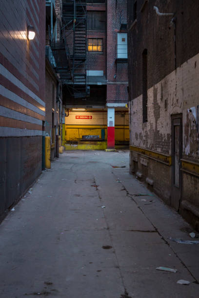 istock Empty Loading Dock in Alley at night with No Smoking Sign 1147327440