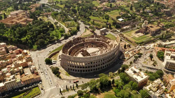 Photo of Aerial view on the  Coliseum, Rome, Italy. Spring, summer. Ancient Rome architecture from drone.