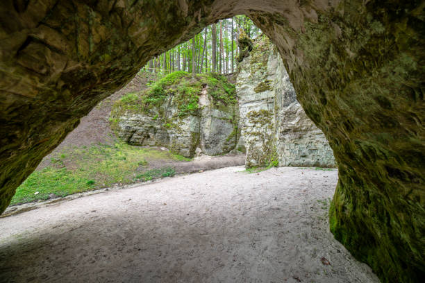 istock sandstone cave entrance in dark 1147328599