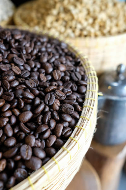 istock Many coffee grains on rough fabric,Roasted coffee beans on sacking 1147329379
