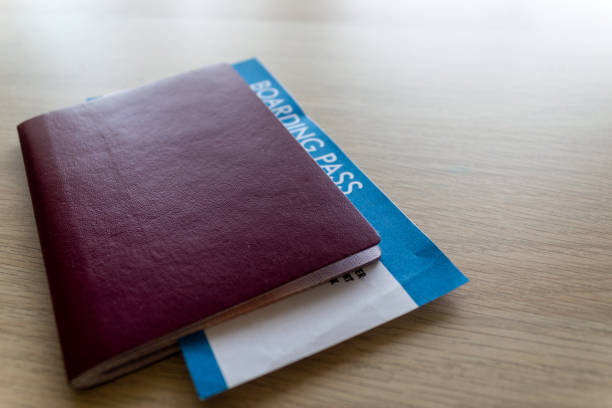 istock Travel concept. Passport and flight boarding pass ticket 1147330851