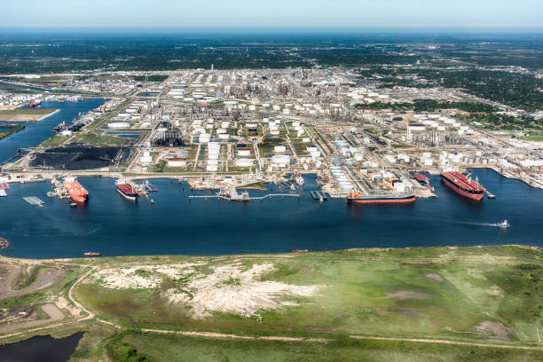 Oil Tankers Docked at an American Refinery Aerial view of tankers docked at an American oil refinery in Texas City, Texas, located just south of Houston on Galveston Bay. gulf coast states stock pictures, royalty-free photos & images