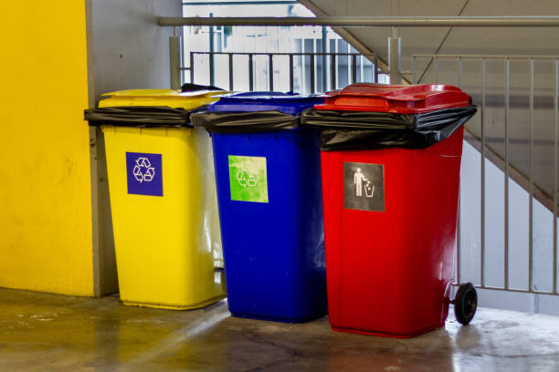 istock Yellow, blue,red recycle trash bin and recycle symbol 1147330979