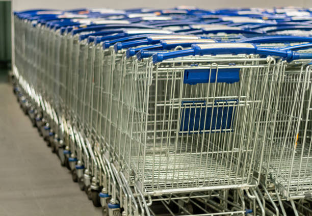 istock Supermarket shopping carts lined up empty 1147331004