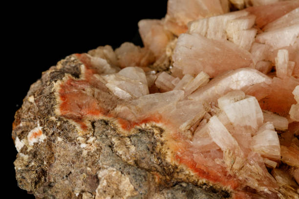 istock Macro of a stone Stilbite mineral on a black background 1147333320