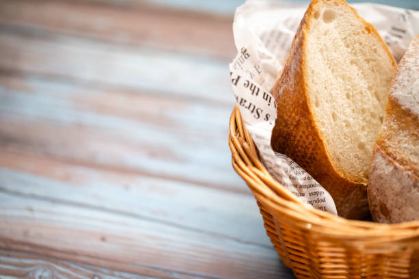 istock Freshly baked bread on wooden table 1147336988