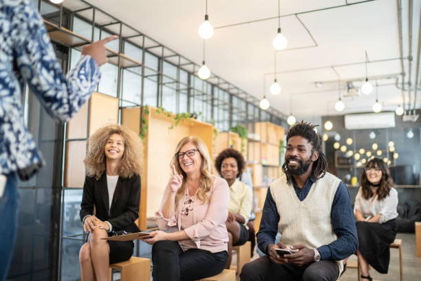 istock Speaker and audience at business convention and presentation 1147337988