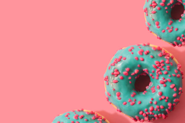 istock Colorful background of donuts with copy space 1147340481