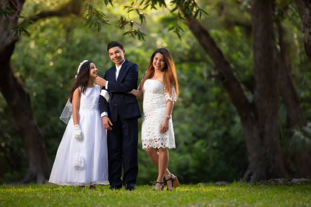 istock First communion day mother and children 1147341952