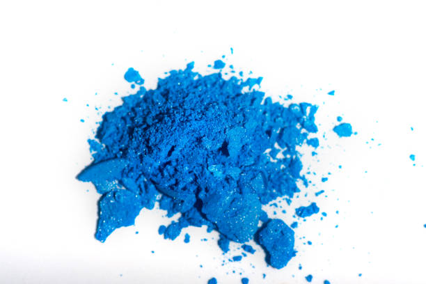 istock crushed blue eye shadow isolated on white background. 1147344874