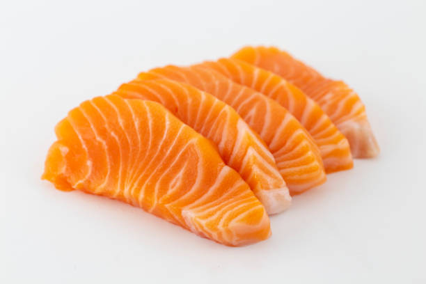istock Salmon raw sashimi isolated on white background 1147346784