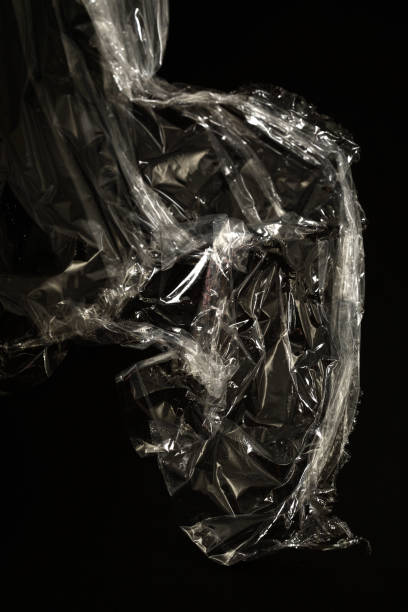 istock plastic food wrap on a black background 1147348398