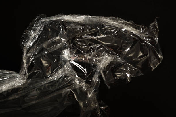 istock plastic food wrap on a black background 1147349920