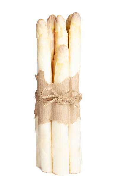 istock Fresh white asparagus isolated on white background 1147351550