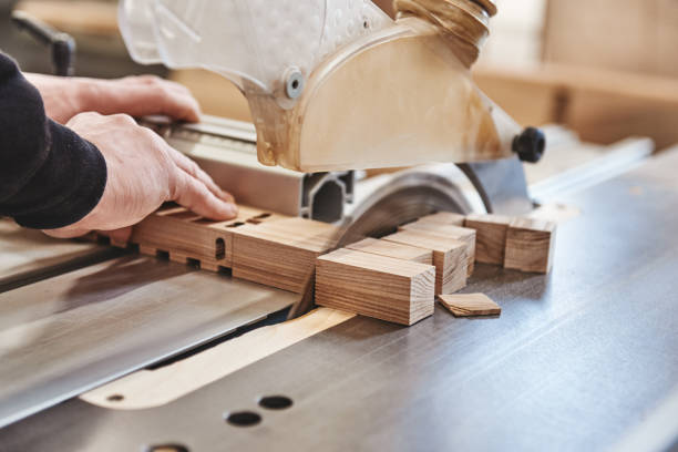 carpenter working with industrial tool in wood factory - carpenter restoring furniture wood imagens e fotografias de stock
