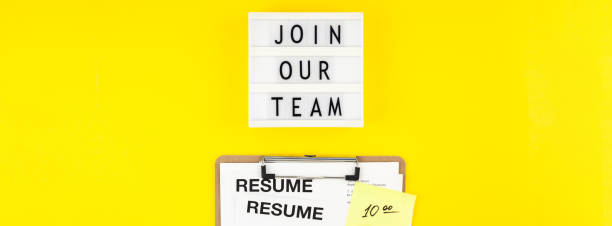 istock Join our team flat lay on yellow background 1147352248