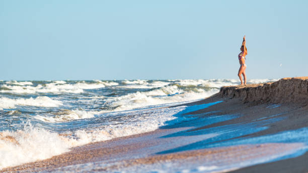 istock Woman enjoying a stormy wind 1147353409