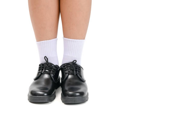 istock boy school student wear a black leather shoes 1147357136