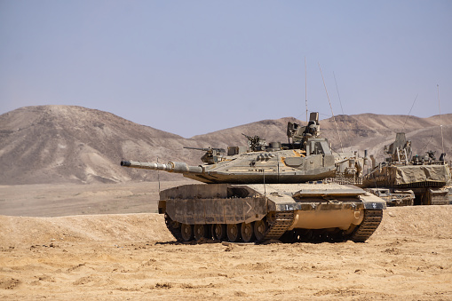 Southern District, Israel - April 10, 2019: Armoured Tank of the Israel Defense Forces in the desert during a sunny day.