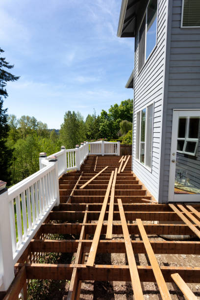 Aged outdoor wooden cedar deck tear down due to weathered boards Aged outdoor wooden cedar deck tear down real estate outdoors vertical usa stock pictures, royalty-free photos & images