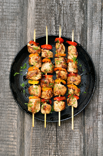 Appetizer chicken kebab with vegetables, top view