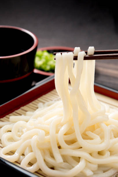 istock Cold udon noodles on a bamboo colander. 1147363272