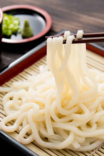 istock Cold udon noodles on a bamboo colander. 1147363292