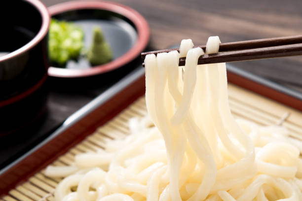 istock Cold udon noodles on a bamboo colander. 1147363315