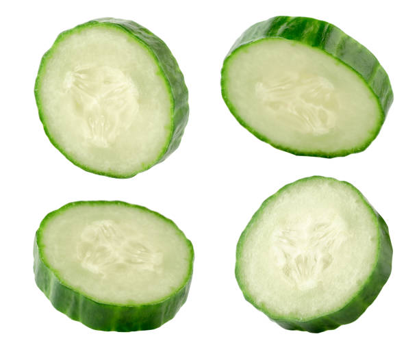 istock Set of cucumber pieces on a white, close up. Isolated. 1147363492
