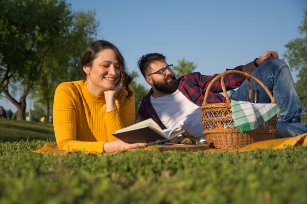 istock Hipster man enjoying in a picnic with his girlfriend 1147363546