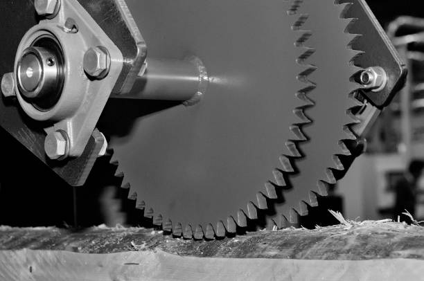 istock Industrial woodworking machine with circular saw disk. Toned image 1147366071