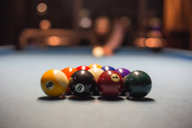 istock young womas starting new pool game at bar 1147369381
