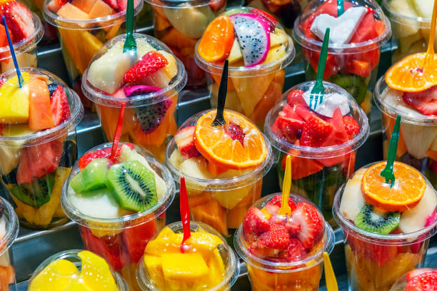 Fruit Salad arranged in plastic cups at the La Boqueria market