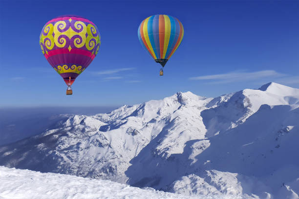 istock Colorful balloons flying over snow-covered mountains 1147374927