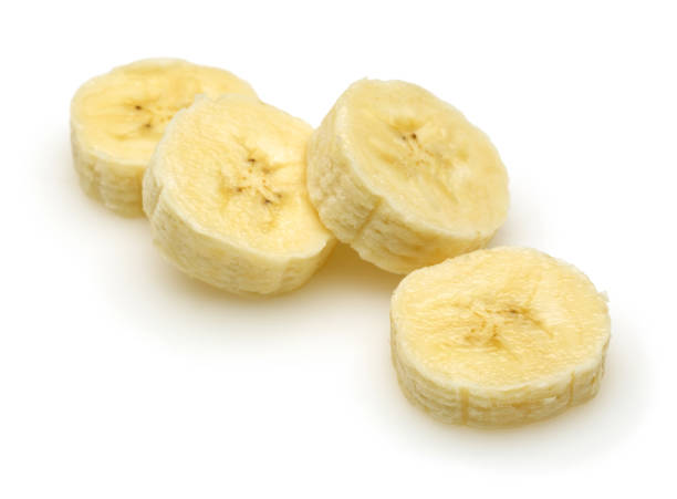 istock Peeled banana slices isolated on white 1147374988