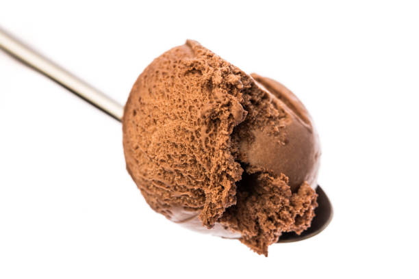 istock spoon full with chocolate ice cream isolated on white background 1147377141