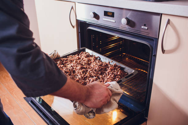 istock Beef Cheese Sliced Chef Cook's Hand oven 1147381398