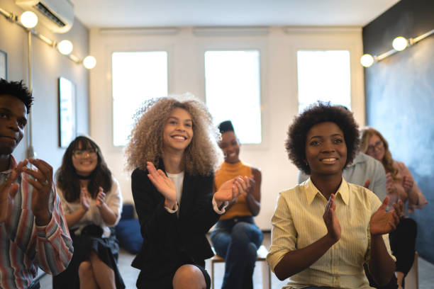 istock Audience Applauding a Great Speaker at Business convention and Presentation 1147382995