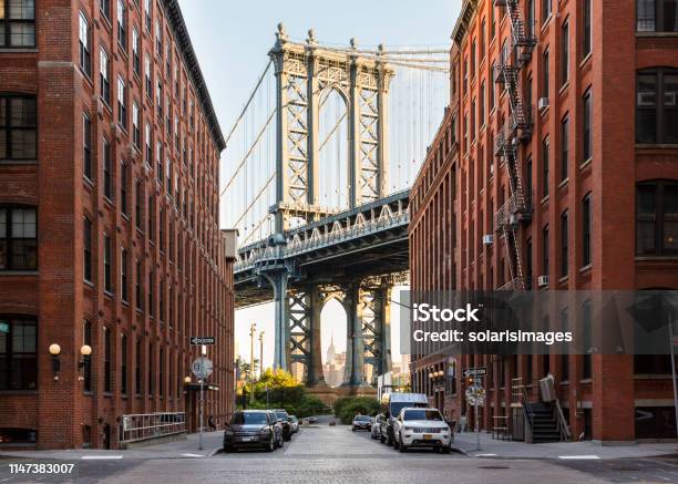 Brooklyn Ny Dumbo Neighborhood Street Scene With Manhattan Bridge And Empire State Builiding Stock Photo - Download Image Now