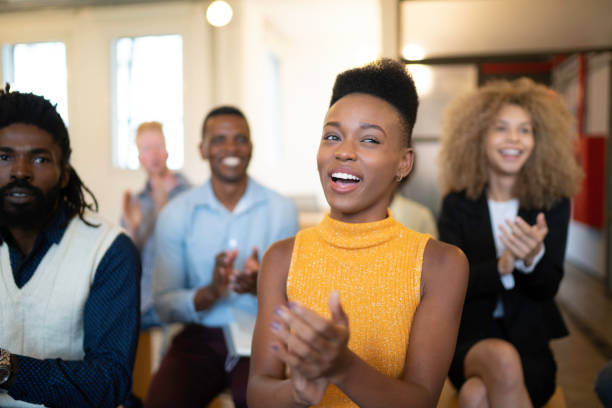 istock Audience Applauding a Great Speaker at Business convention and Presentation 1147385602